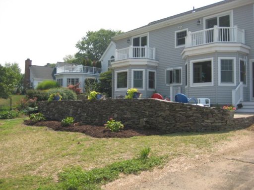 Privacy wall around stone patio