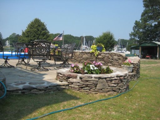 Natural Stone Patio with Natural Stone Privacy Wall