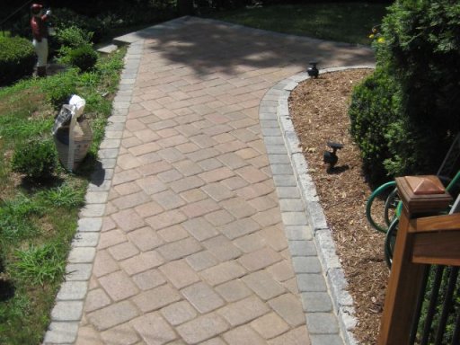 Redstone paver Walkway with grey stone edging